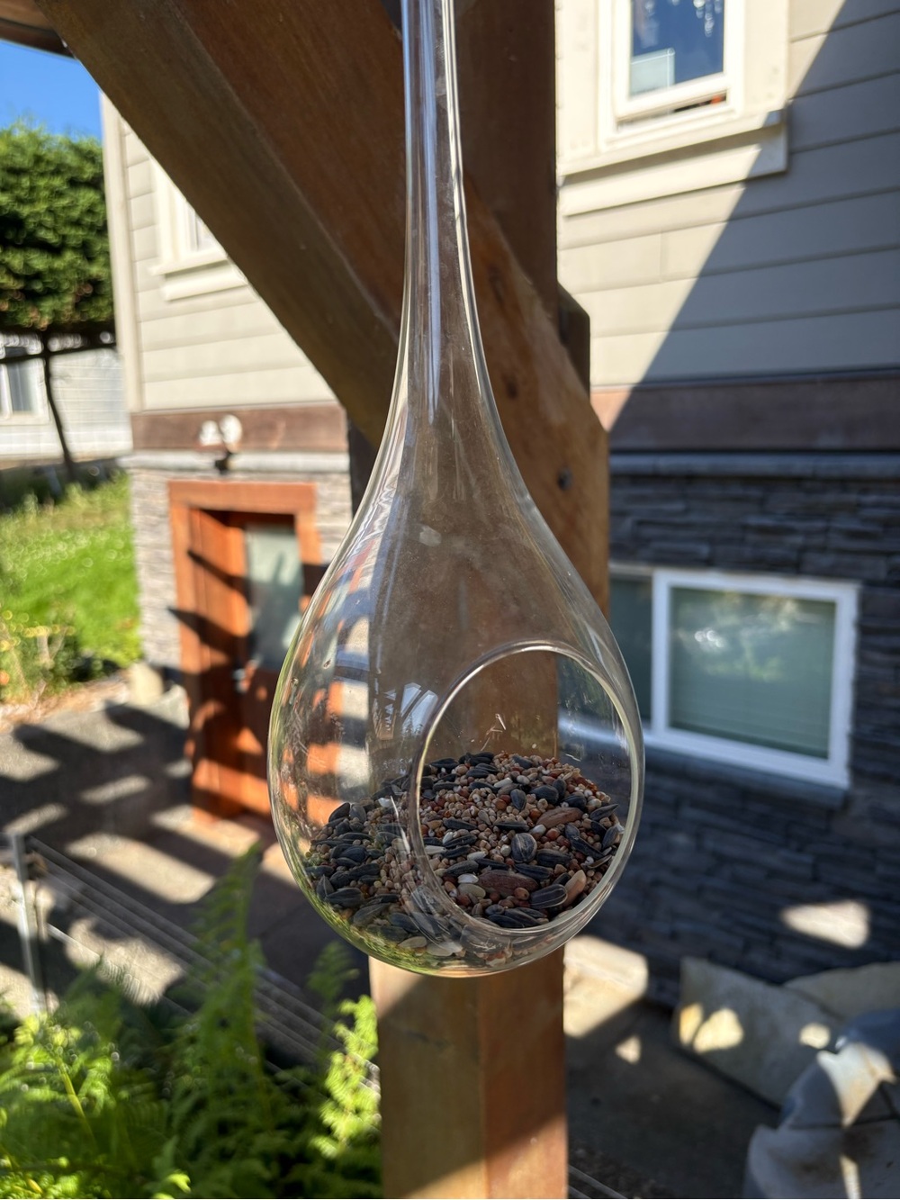 Hand blown glass, teardrop shaped birdfeeder